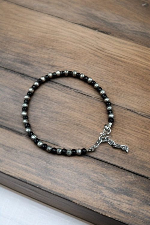Crystal anklet with silver look finish and stone detailing for casual wear.