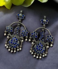 Ethnic peacock earrings with oxidized silver replica finish, stone and pearl work.