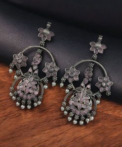 Ethnic peacock earrings with oxidized silver replica finish, stone and pearl work.
