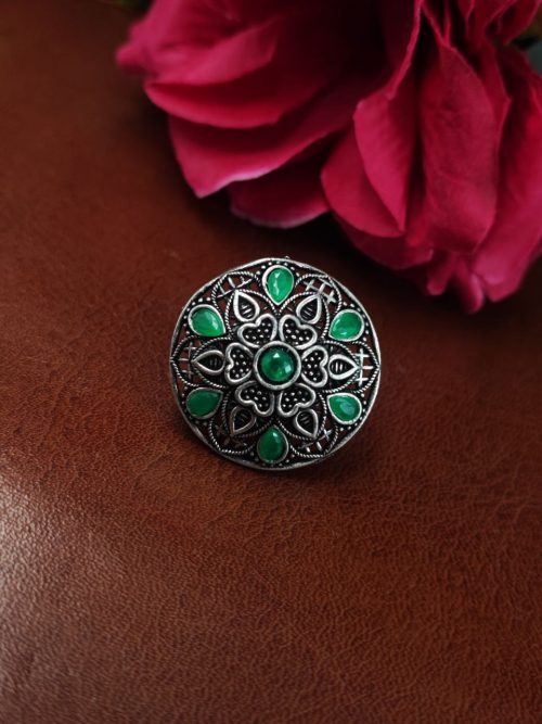 Oxidized silver heart ring with stone accent.