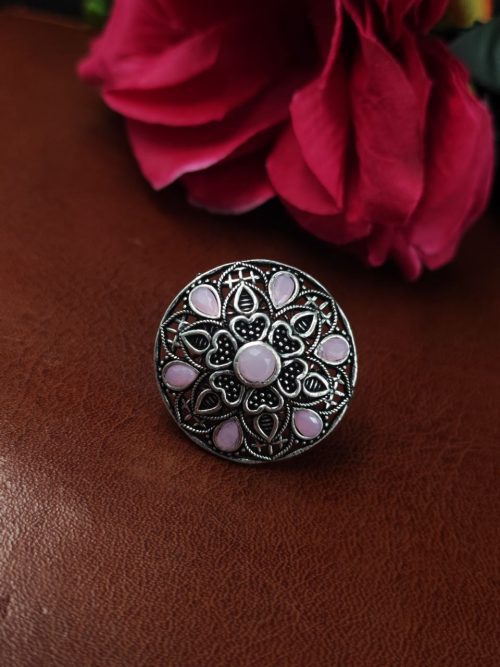 Oxidized silver heart ring with stone accent.