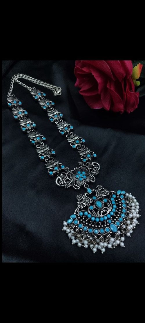 Elegant oxidized silver flower necklace with pearl and stone work.