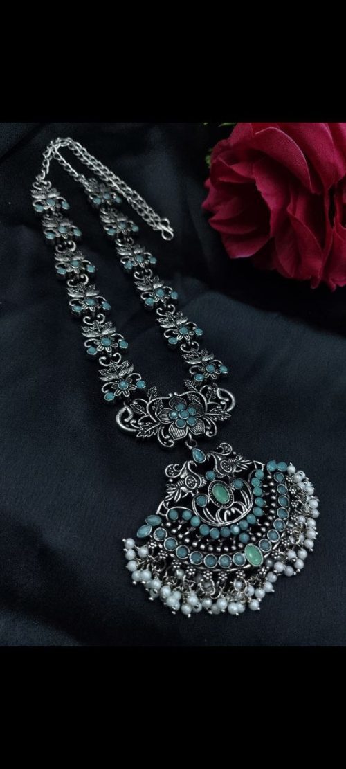 Elegant oxidized silver flower necklace with pearl and stone work.
