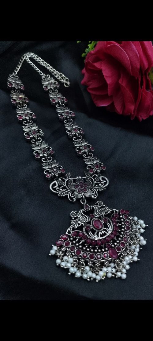 Elegant oxidized silver flower necklace with pearl and stone work.