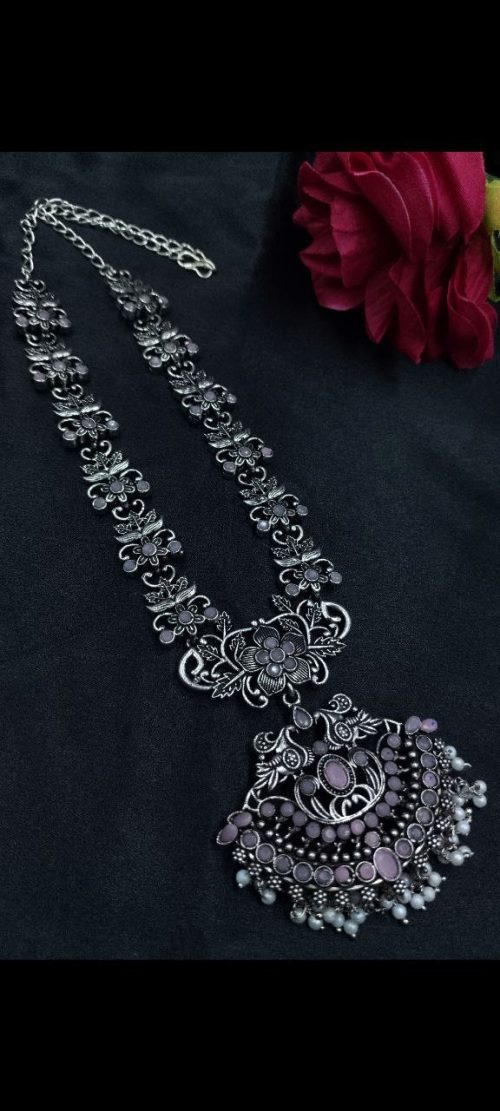 Elegant oxidized silver flower necklace with pearl and stone work.