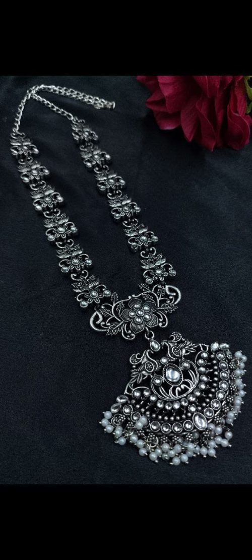 Elegant oxidized silver flower necklace with pearl and stone work.