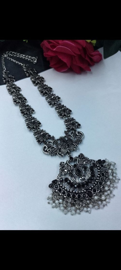Elegant oxidized silver flower necklace with pearl and stone work.