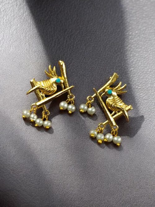 Handcrafted gold-plated bird earrings with pearl detailing.