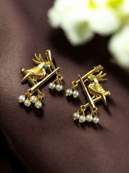 Handcrafted gold-plated bird earrings with pearl detailing.