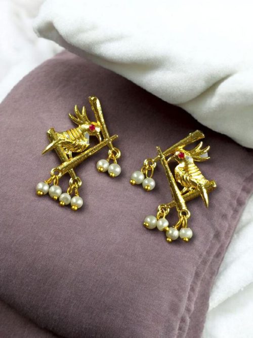 Handcrafted gold-plated bird earrings with pearl detailing.