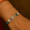 Gold plated designer rakhi for brother 2025
