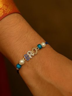 Gold plated designer rakhi for brother 2025