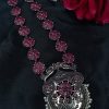 Silver-plated peacock necklace with pearls and stones.