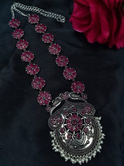 Silver-plated peacock necklace with pearls and stones.