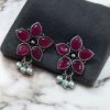 Ethnic flower stud earrings with pearl and stone detailing