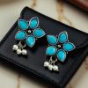 Ethnic flower stud earrings with pearl and stone detailing