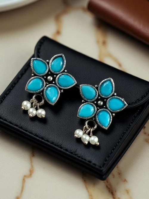 Ethnic flower stud earrings with pearl and stone detailing