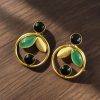 Gold plated leaf and circle earrings with Monalisa stone