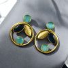 Gold plated leaf and circle earrings with Monalisa stone