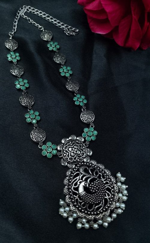 Oxidized silver plated peacock necklace with pearl and stone detailing