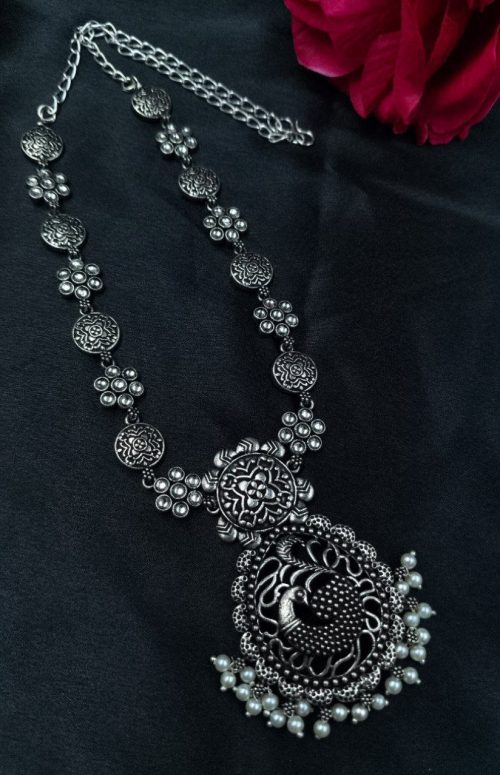 Oxidized silver plated peacock necklace with pearl and stone detailing