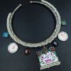 Oxidized Ganesha Hasli necklace with parrot design, Monalisa stones, and pearl work.