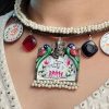 Oxidized Ganesha Hasli necklace with parrot design, Monalisa stones, and pearl work.