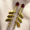 Gold plated leaf earrings with Monalisa stone in western style