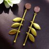 Gold plated leaf earrings with Monalisa stone in western style