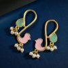 Gold plated enamel bird earrings with stone and pearl design