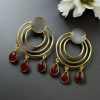 Gold plated round dangler earrings with Monalisa stone in ethnic western design