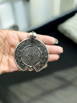 Handcrafted German silver pendant made with a DIY kit, featuring a unique design perfect for gifting or personal wear.