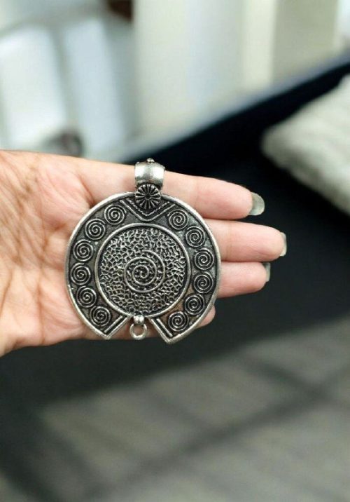 Handcrafted German silver pendant made with a DIY kit, featuring a unique design perfect for gifting or personal wear.