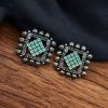 Handcrafted brass square stud earrings with natural stone detailing, featuring a modern and minimalist design