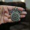 DIY peacock pendant made from premium German silver, featuring intricate detailing and elegant handcrafted design.