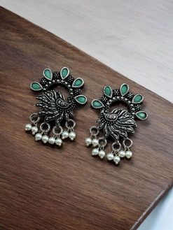 Silver-plated brass peacock stone earrings adorned with colorful stones, perfect for festive occasions