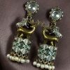 Unique two-tone German silver earrings with stone stud and elegant hanging design, perfect for ethnic and fusion wear.