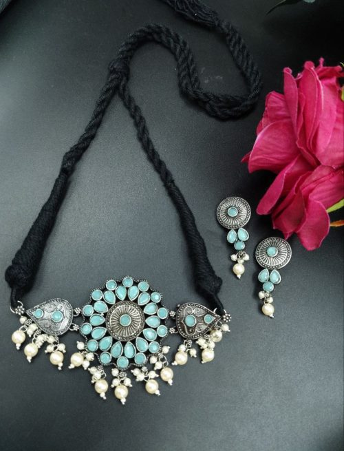 Handcrafted brass choker necklace with colorful stones, thread detailing, and matching earrings – ethnic jewelry set for women