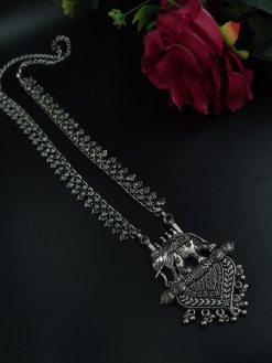 Elegant long necklace featuring a detailed brass and German silver elephant pendant, perfect as a statement piece.