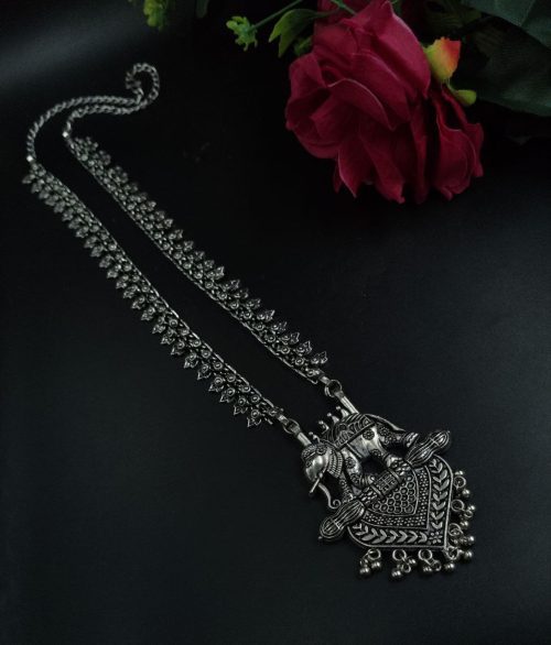 Elegant long necklace featuring a detailed brass and German silver elephant pendant, perfect as a statement piece.