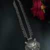 Bold and elegant long necklace made of brass and German silver, featuring traditional design elements.