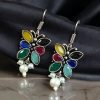 Pair of beautiful brass butterfly hook earrings with sparkling stone accents, ideal for daily wear