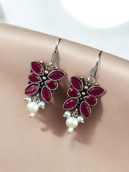 Pair of beautiful brass butterfly hook earrings with sparkling stone accents, ideal for daily wear