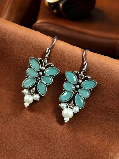 Pair of beautiful brass butterfly hook earrings with sparkling stone accents, ideal for daily wear