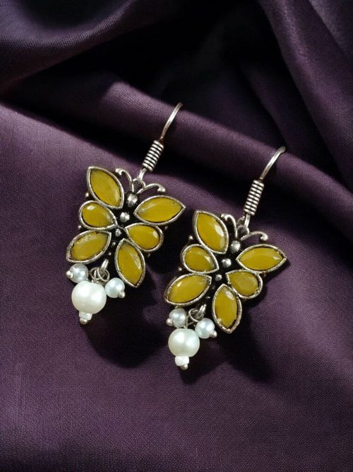 Pair of beautiful brass butterfly hook earrings with sparkling stone accents, ideal for daily wear