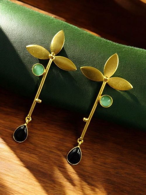 Premium gold-plated brass long stud earrings featuring sparkling Monalisa stones, perfect contemporary design.