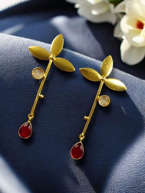 Premium gold-plated brass long stud earrings featuring sparkling Monalisa stones, perfect contemporary design.