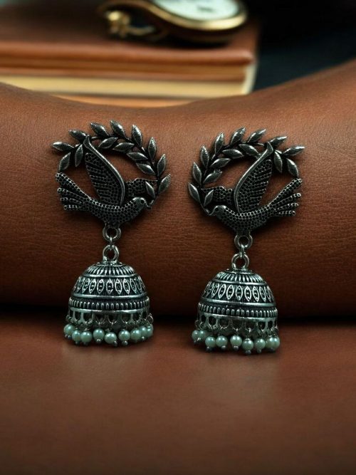German silver jhumka earrings with bird-shaped studs, perfect for ethnic and traditional wear.