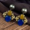 Two-tone brass earrings featuring an elegant peacock design with shimmering Monalisa stone accents, perfect for all occasions.