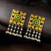 Premium gold plated brass Meenakari stud earrings with vibrant enamel detailing, perfect for traditional and festive occasions.